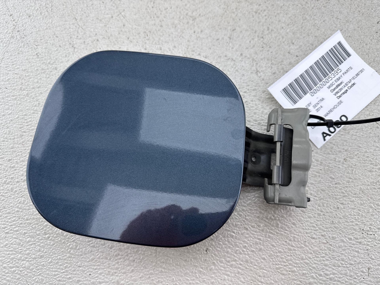 2013-2019 Nissan Sentra Fuel Door Oem Raq - Graphite Blue