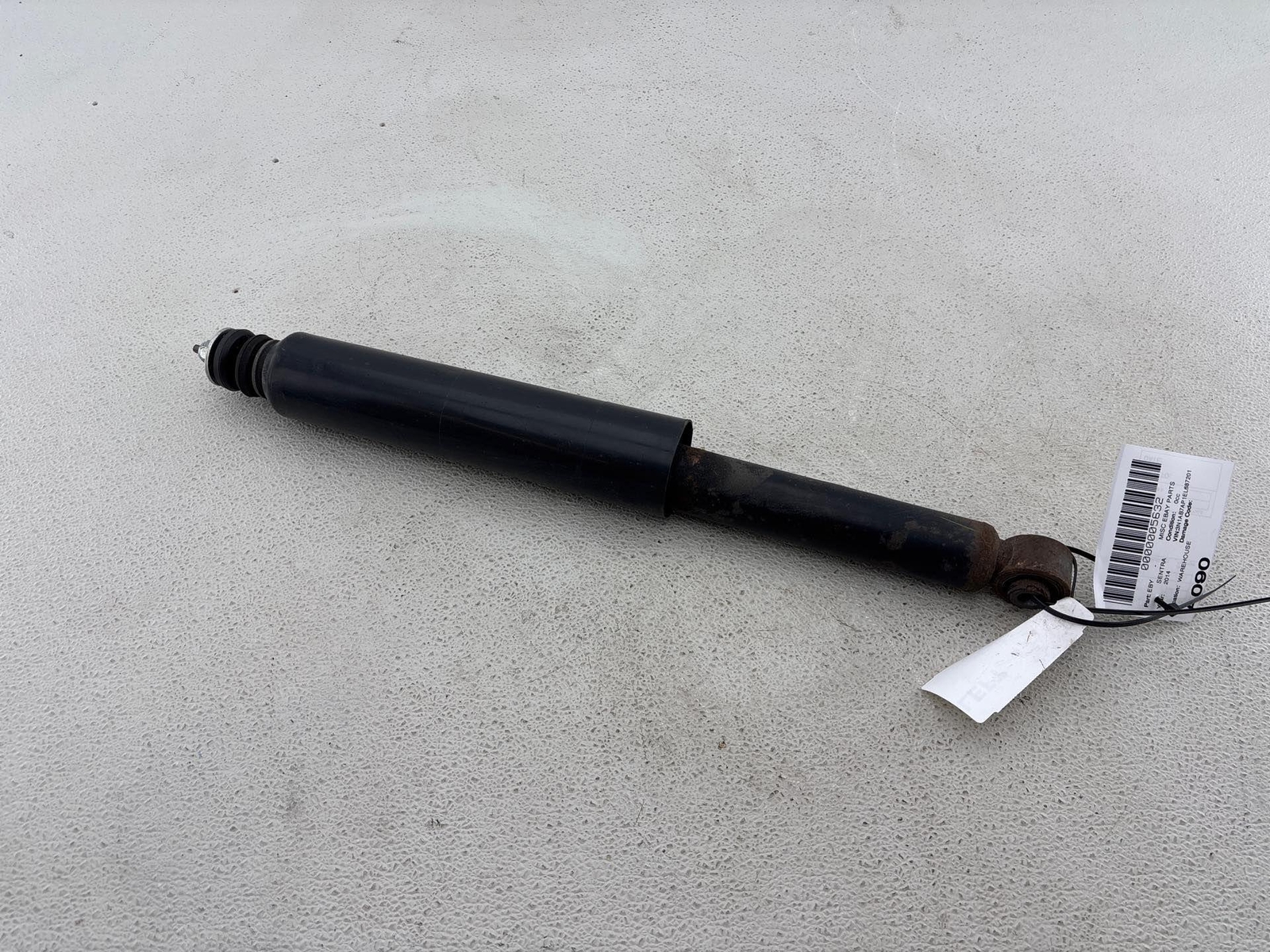 2013-2019 Nissan Sentra Rear Left Suspension Shock Absorber Black Oem