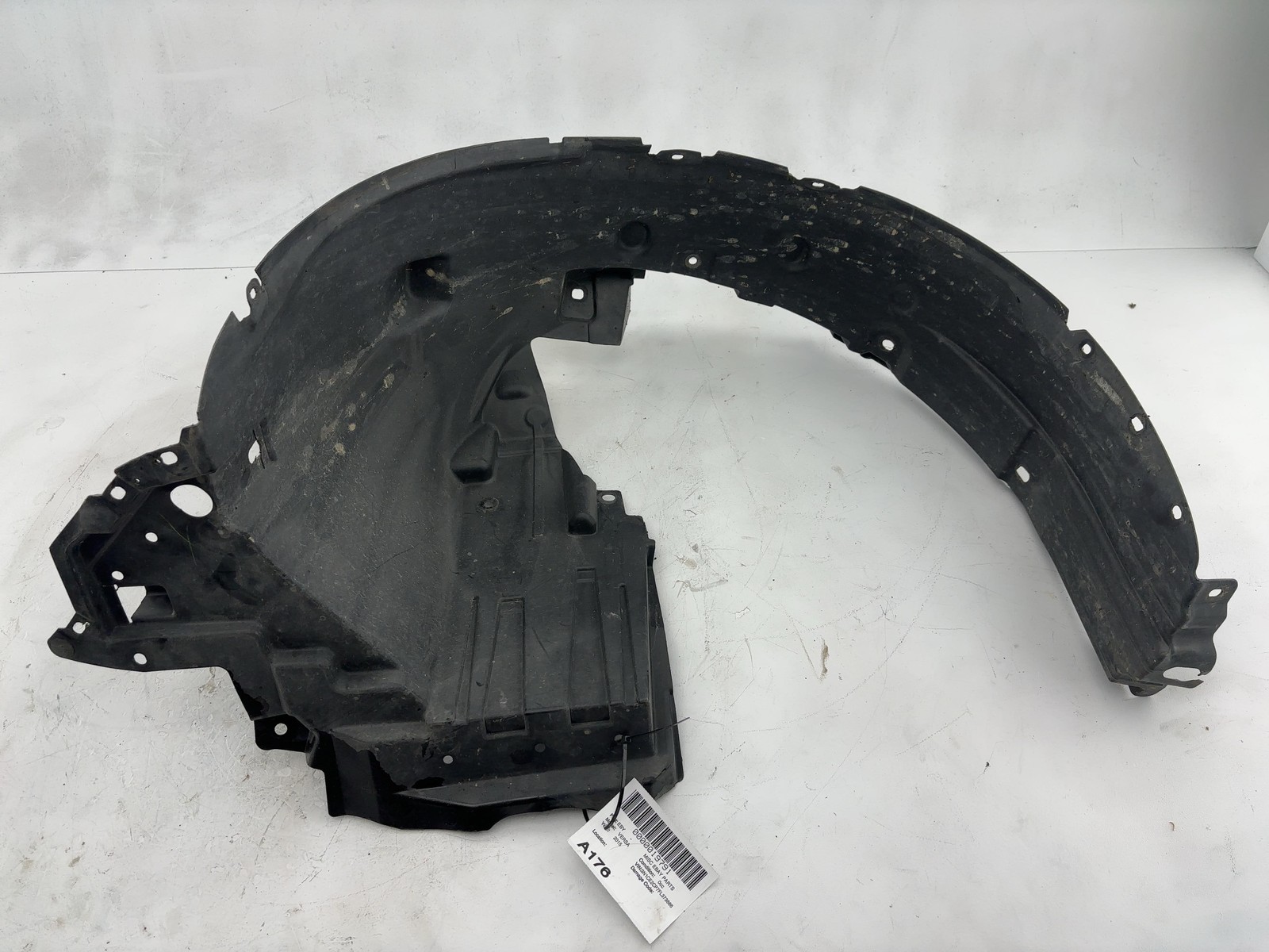 2014-2019 Nissan Versa Left Front Fender Liner 638433WC0A OEM